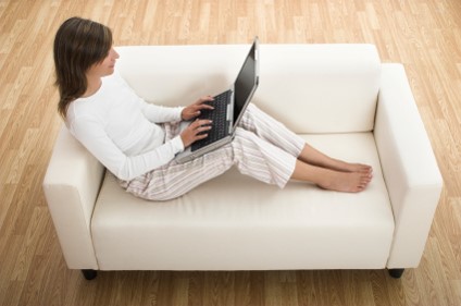 Woman in jammies on couch